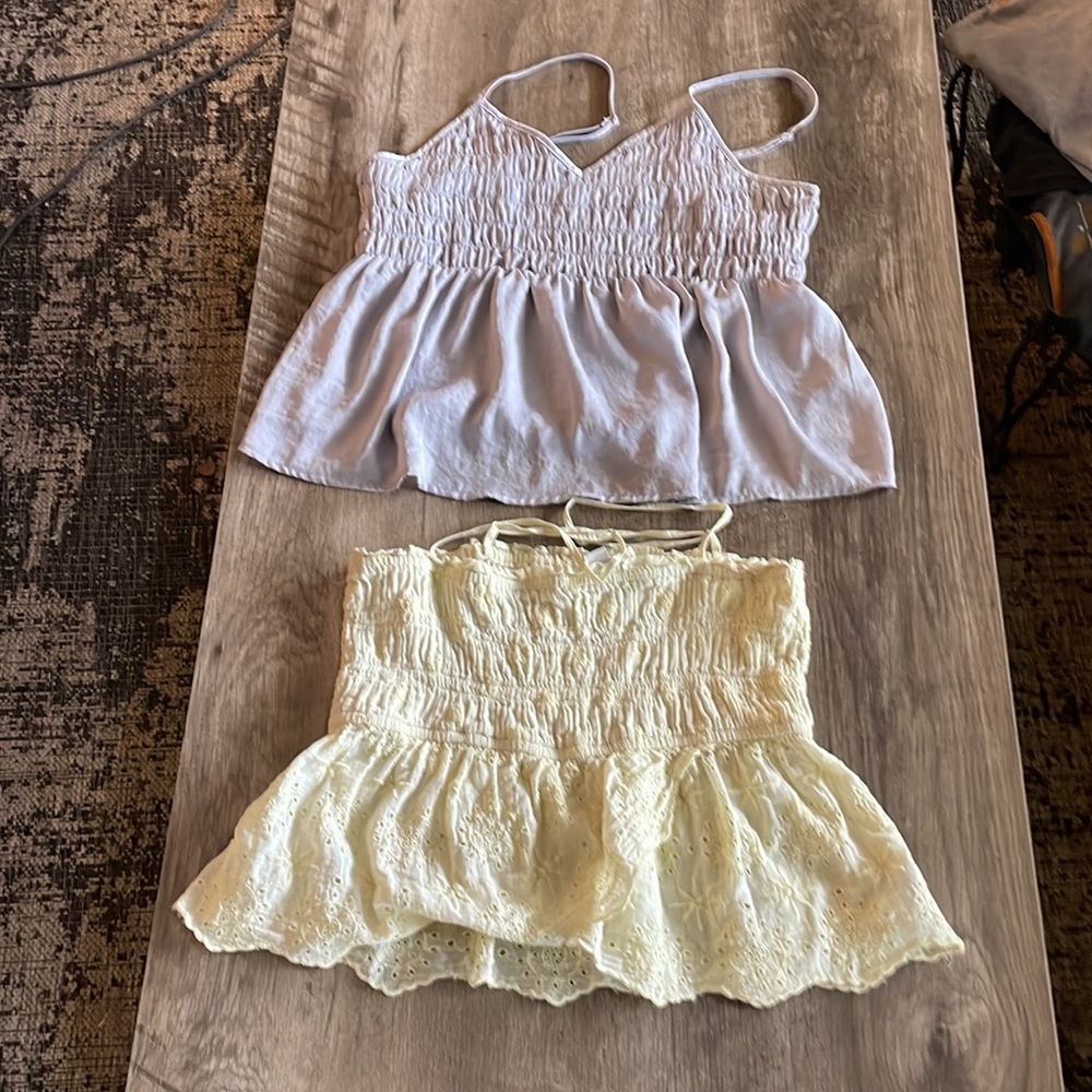 AMERICAN EAGLE TOPS. one medium and one large.